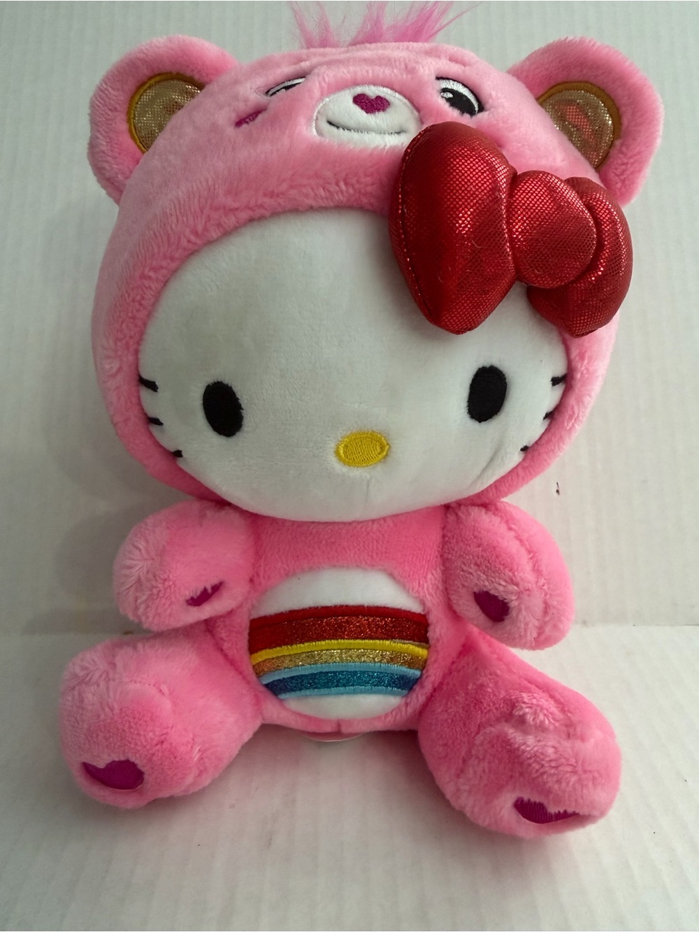 Basic Fun Hello Kitty X Care Bears Cross Plush in Bear Outfit with Rainbow Belly